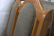 details on fabric of the upholstery work on the kitchen chairs